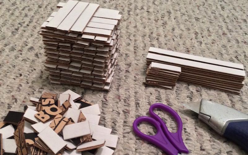 Stacking the cardboard pieces